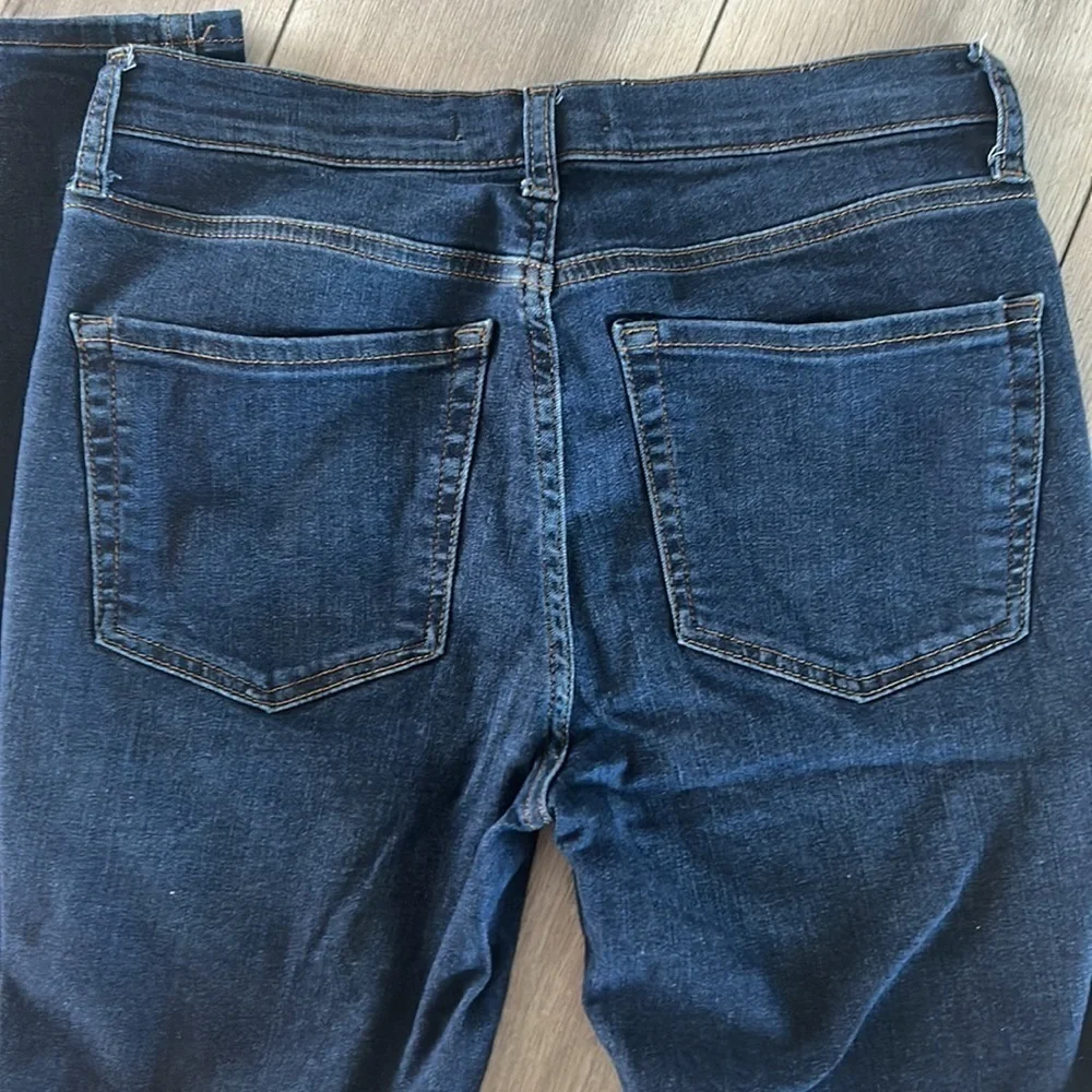 Free People size 27 busted knee skinny jeans